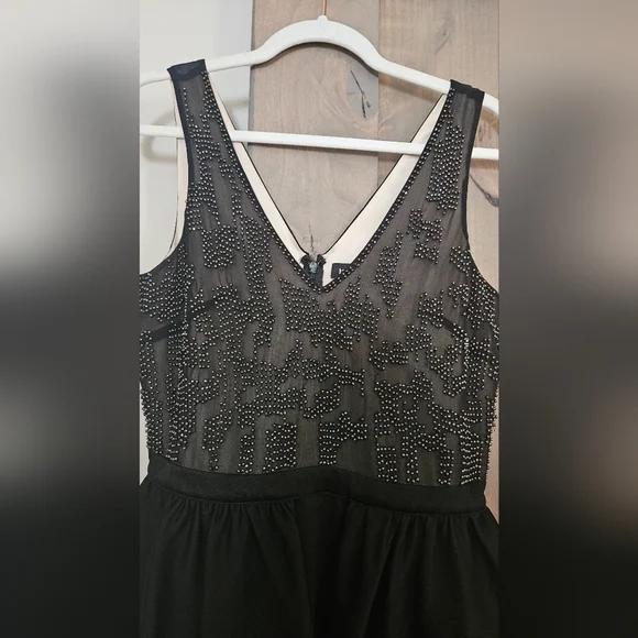 BEBE 90s Beaded top peplum mini dress. Size small - Picture 4 of 11